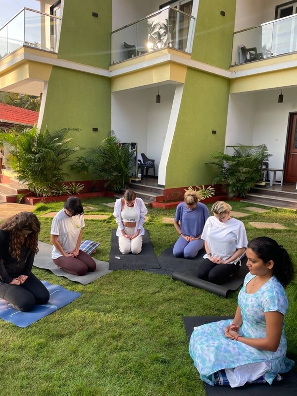 300 Hour Yoga Teacher Training Students Performing Yoga Poses at Rishikul Yogshala