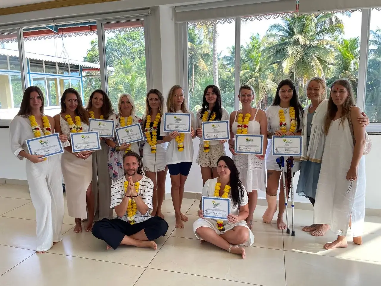 A Group of Students Holding 200 Hours YTTC Certificates in Goa at Rishikul Yogshala