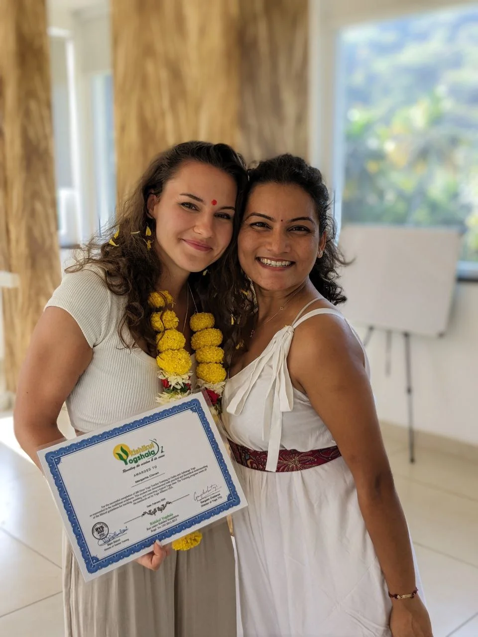 300 Hour Yoga Teacher Training Students Holding Their Yoga TTC Certificate at Rishikul Yogshala in Mysore