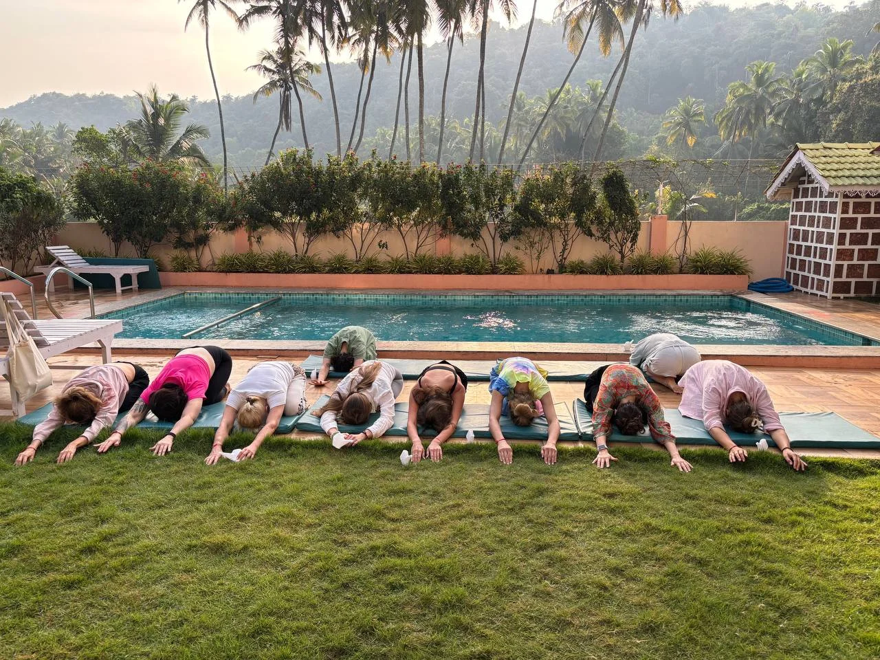 300 Hour Yoga Teacher Training Course Students Performing Child Pose at Rishikul Yogshala in Mysore