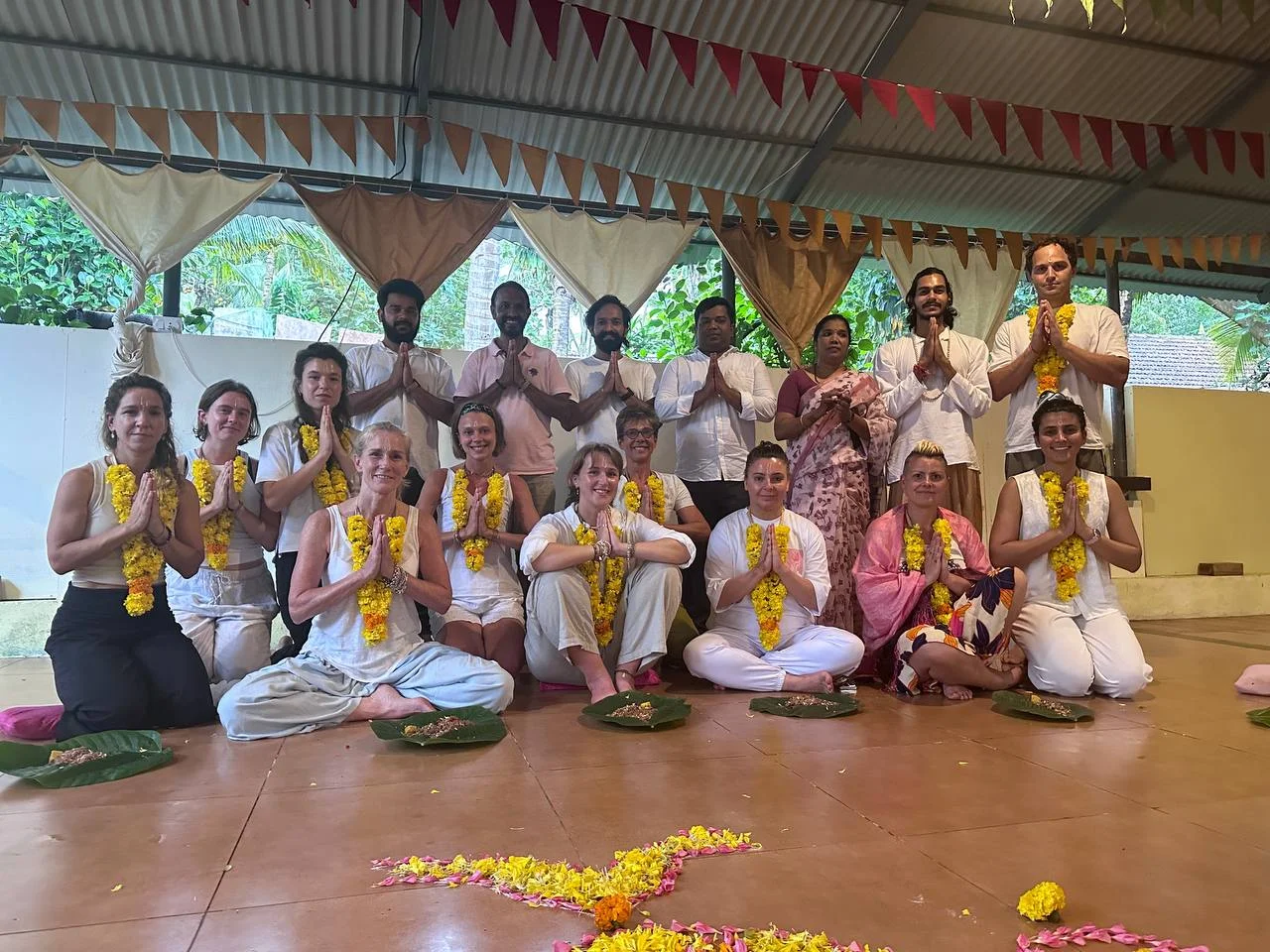 Group of Yoga Students Celebrating the Yoga Retreat Opening Ceremony at Rishikul Yogshala