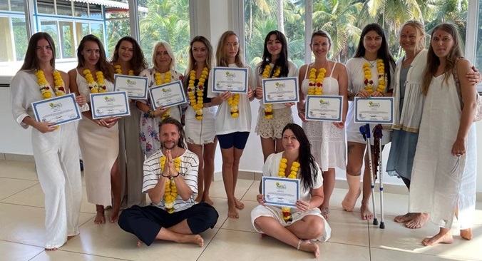 Rishikul Yogshala Students Holding Their 300 Hours YTTC Certificates