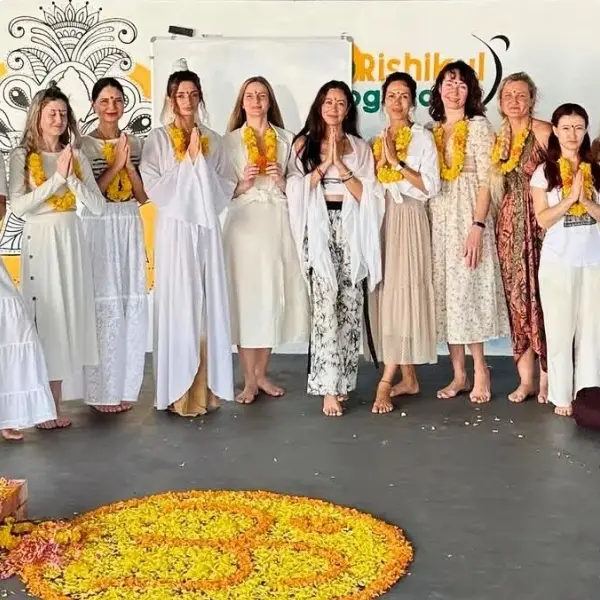 Students of Rishikul Yogshala Holding their 100 Hour Yoga Teacher Training Certificates