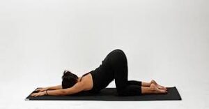 5-yoga-poses-for-tight-shoulders-extended-puppy-pose