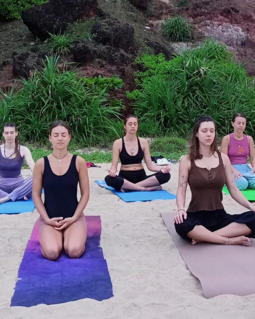 Student Chanting Gayatri Mantra During Yoga Session at Rishikul Yogshala