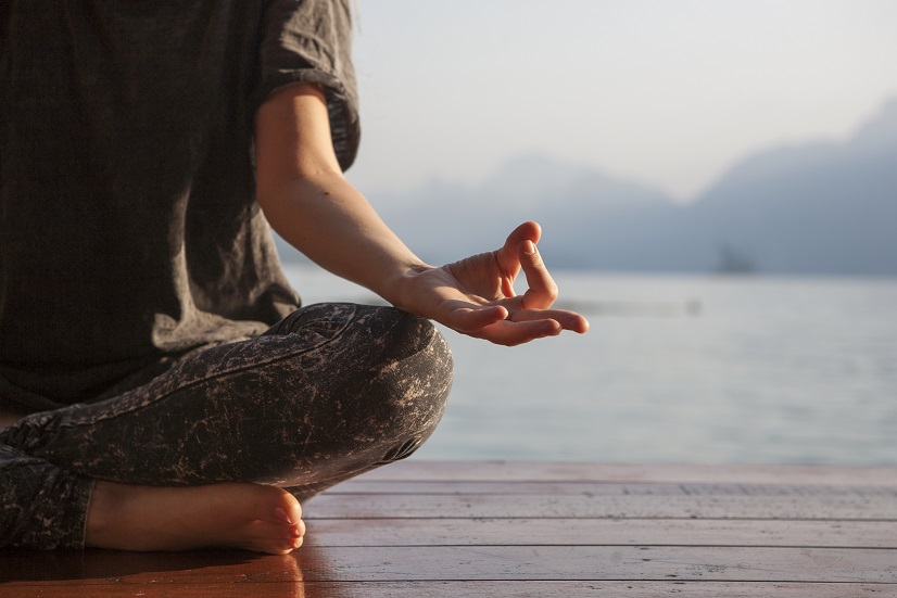 Woman Practicing Meditation