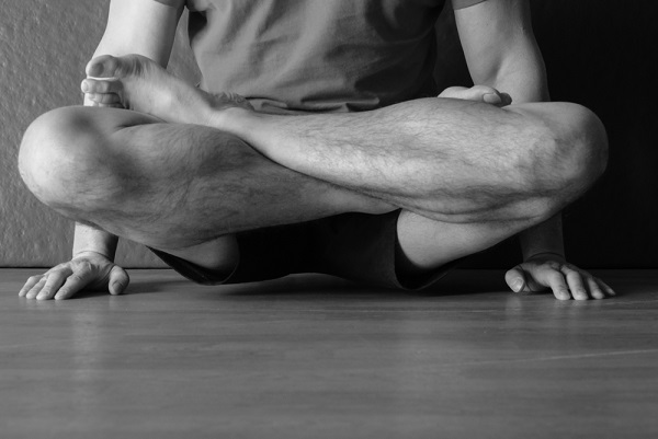 elevated lotus yoga pose