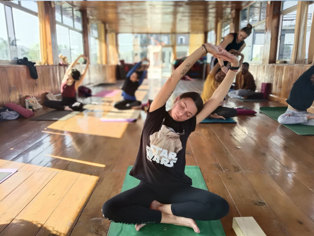 Yoga Teacher Training Class - Deepening Practice in a Nepal Students practicing yoga Yoga Teacher Training session in Nepal