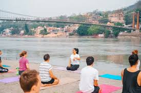Instructor teaching Yoga at rishikesh Instructor teaching Yoga at rishikesh