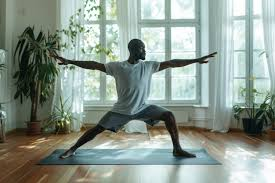 Warrior II Pose – Strength, Balance, and Focus in Yoga. Man practicing the Warrior II Pose (Virabhadrasana II)