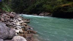 SERENE RIVER FLOWING OVER SMOOTH STONES IN A TRANQUIL POND SERENE RIVER FLOWING OVER SMOOTH STONES IN A TRANQUIL POND