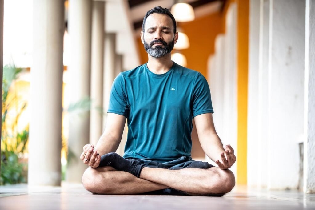Man doing Bhakti Yoga by remembering God Man doing Bhakti Yoga by remembering God